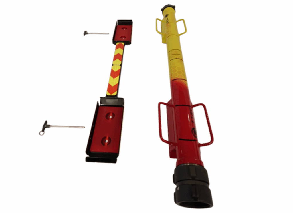 Two vintage manual water pumps with hand cranks and colorful designs.